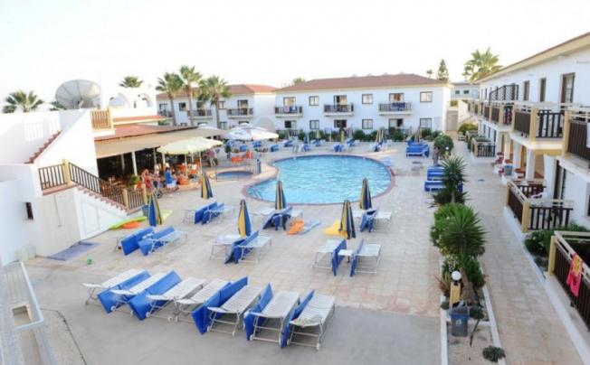 Фото отеля Cosmelenia Hotel Apartments